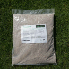 Bag of preseeder on grass with a label